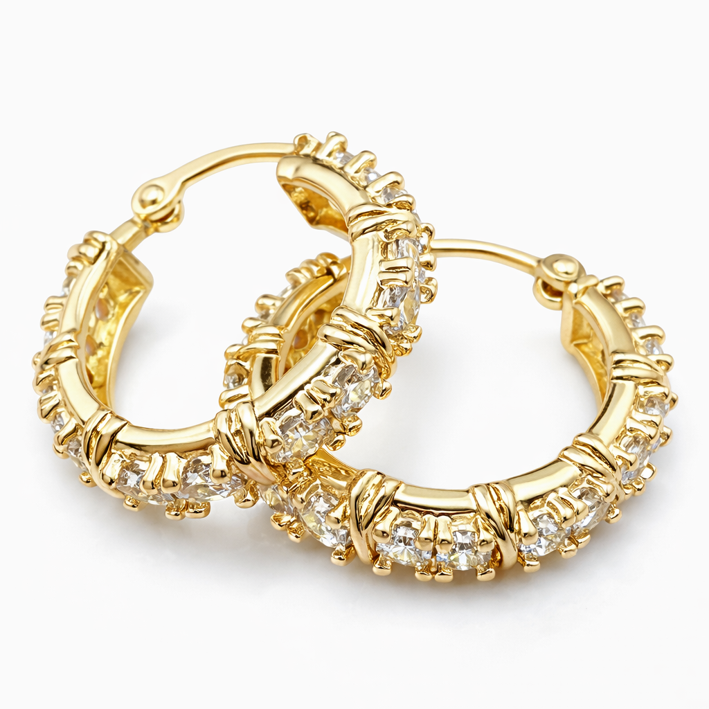 Delicate gold bamboo hoop earrings with sparkling crystal embellishments
