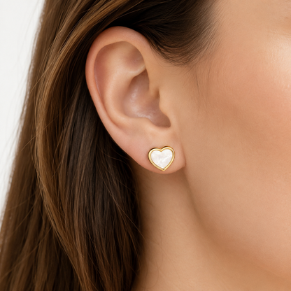 Cute white shell heart earrings with gold frame. Made of pure white Kamado.
