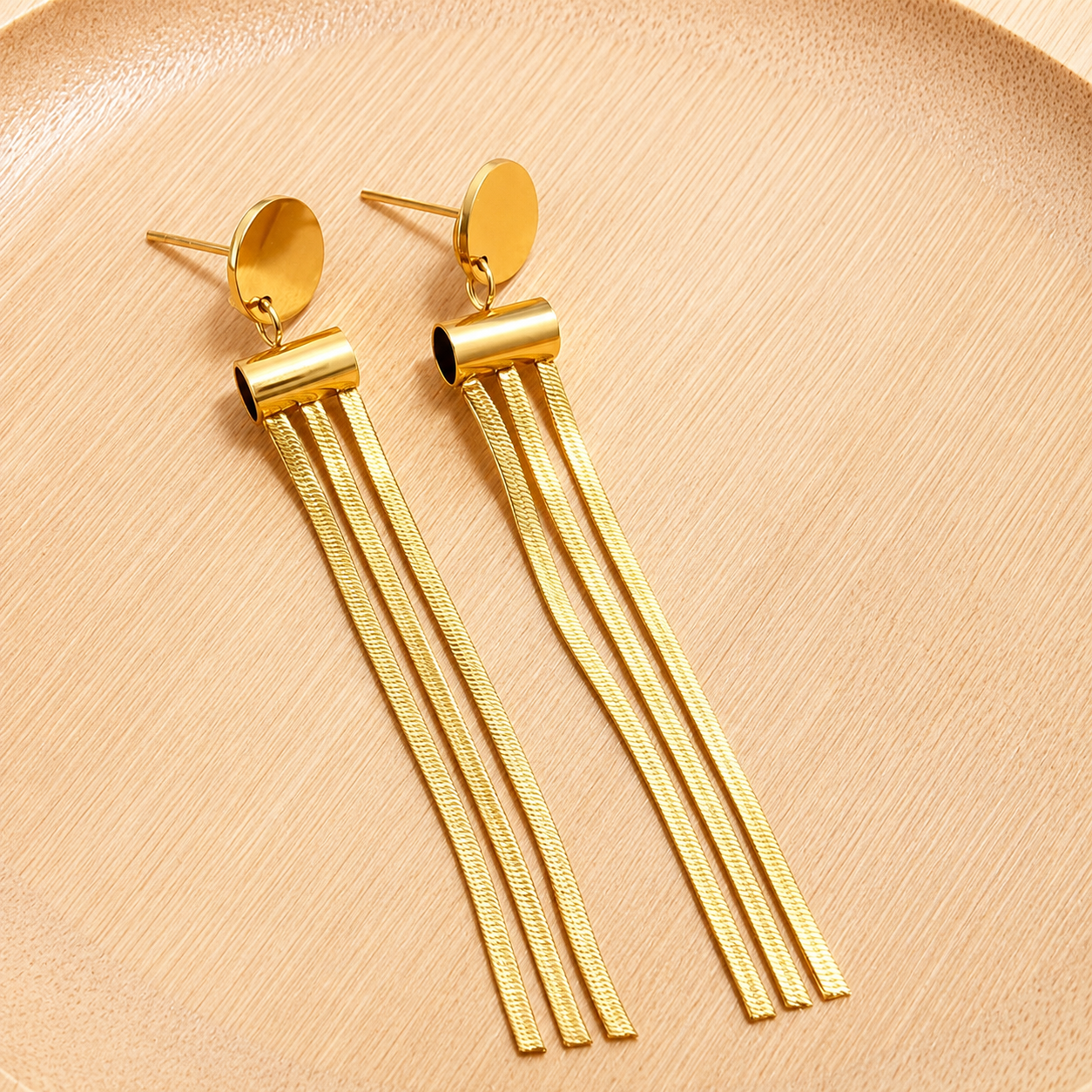 「XINXINIO」ゴールド ロングピアス フリンジ タッセル 丸型 揺れる シンプル レディース
