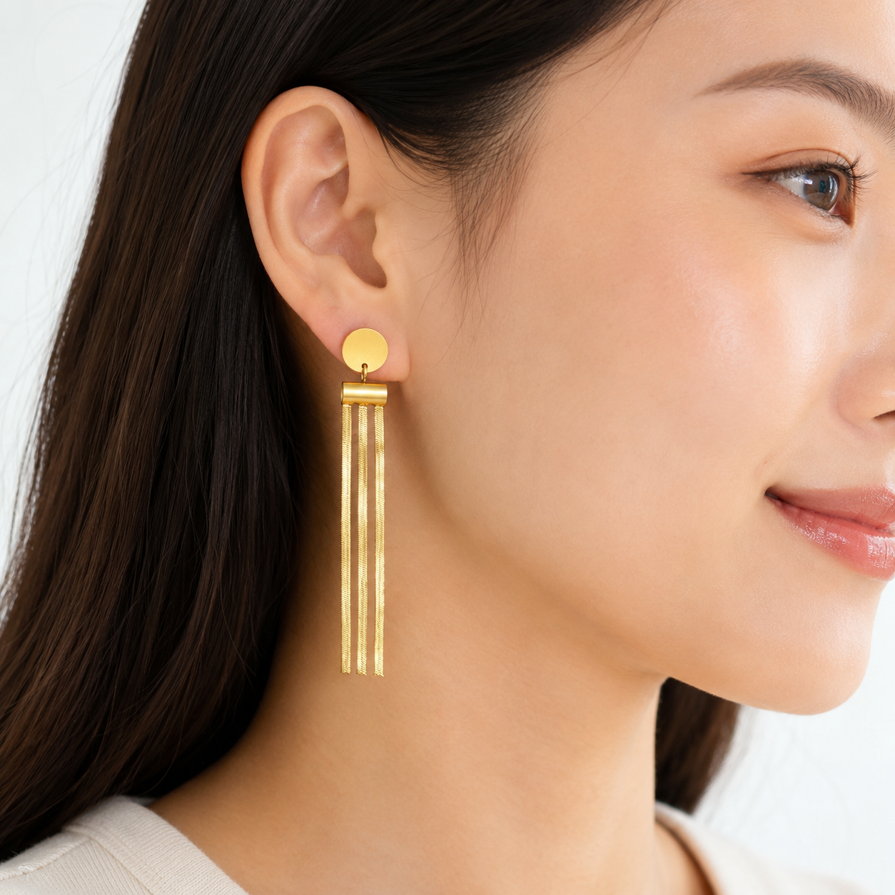 「XINXINIO」ゴールド ロングピアス フリンジ タッセル 丸型 揺れる シンプル レディース